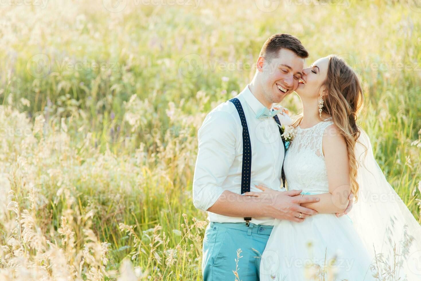 the bride and groom are photographed on the nature photo