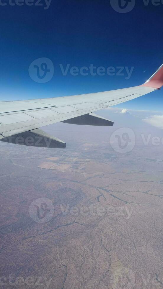 airplane wing, airplane flight. it can be used for posts and stories, used as a background for design photo