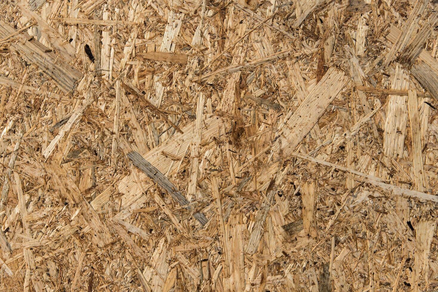 texture of a wooden plate from compressed shavings photo
