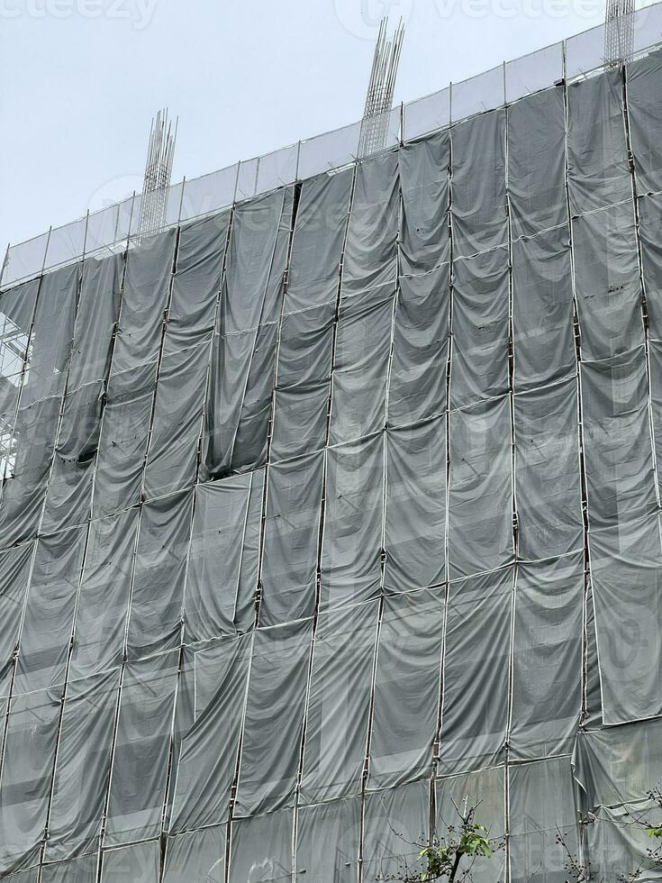 construction of a building with a scaffolding photo