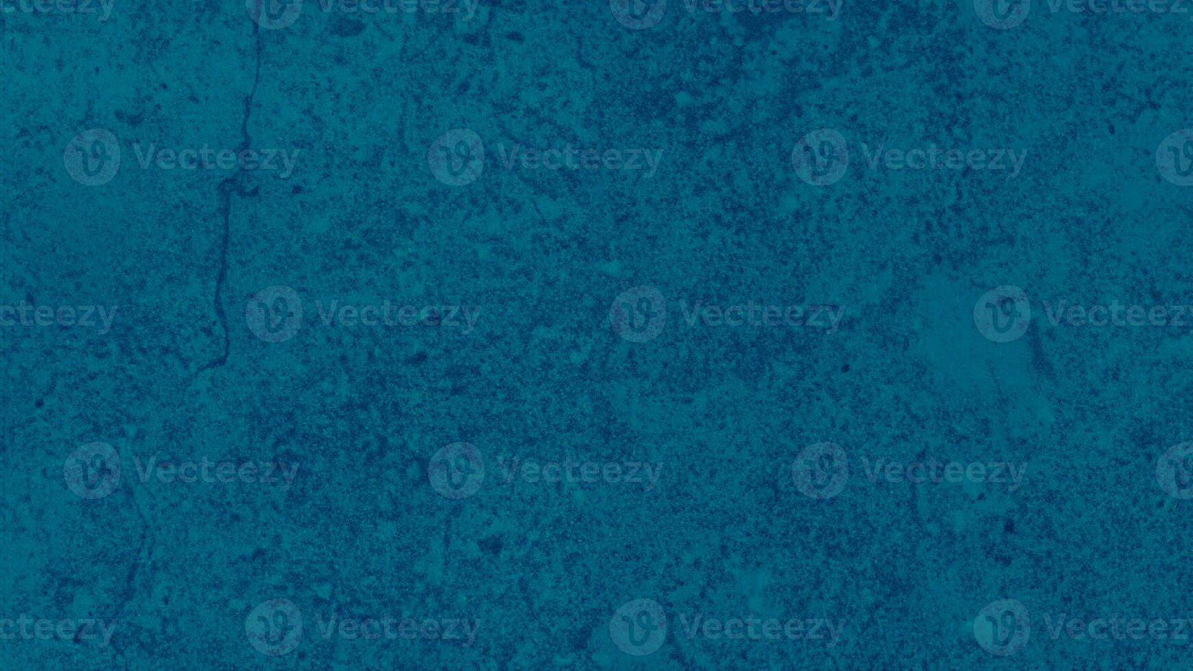 abstract blue grained marble stone texture use for background. rustic navy stone or rock with beautiful mineral veins. printed stone texture on interior tile background. photo