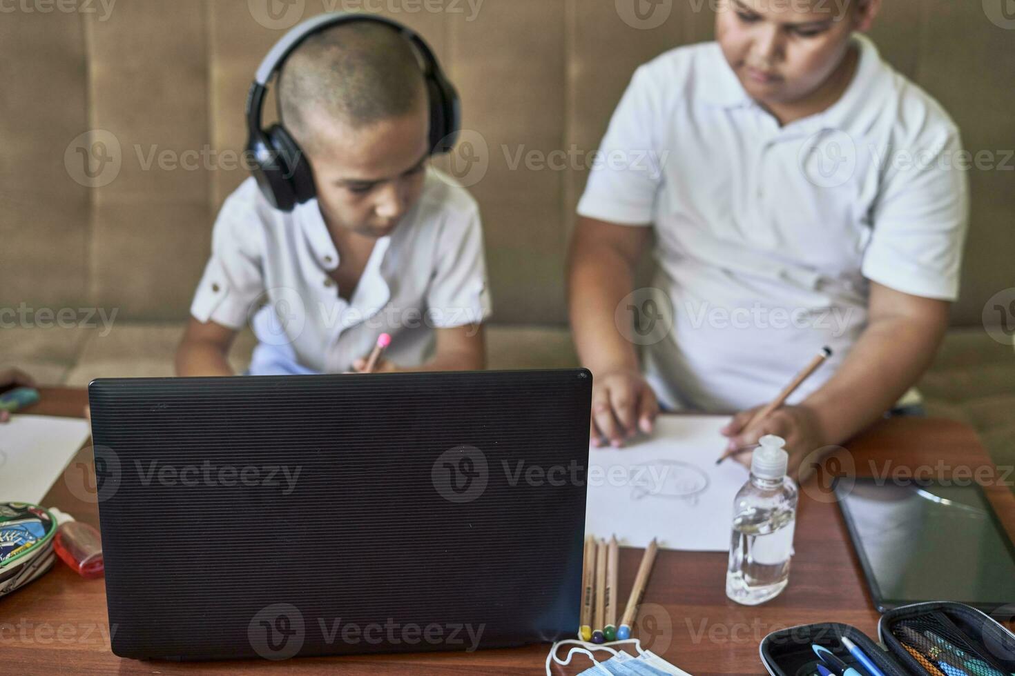 Boys studying together photo