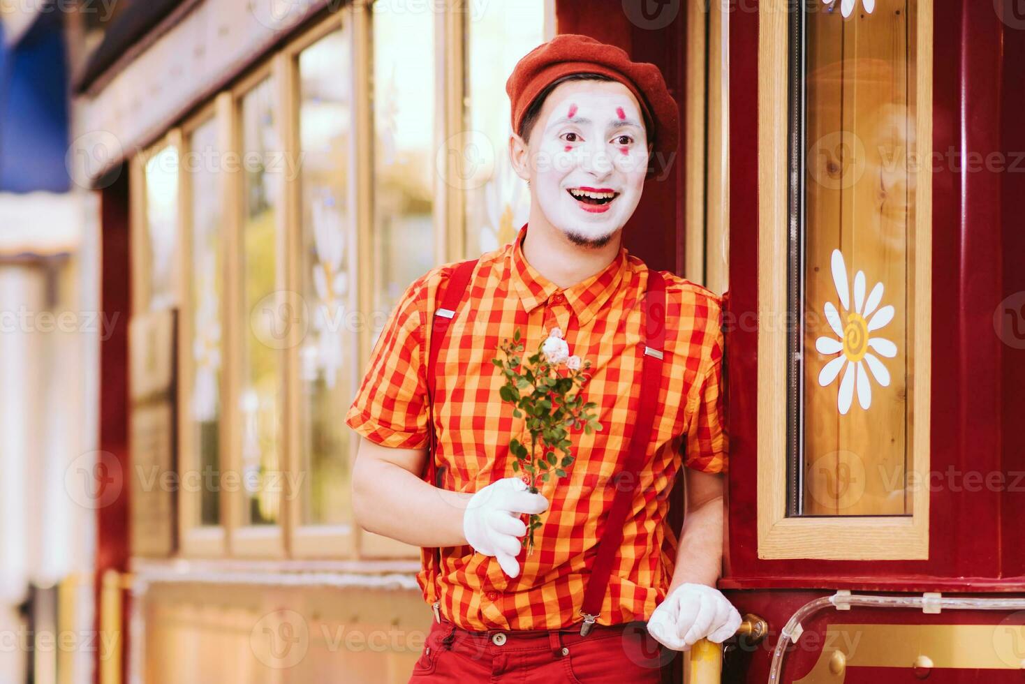 Mime on the street waiting to meet with his lover photo