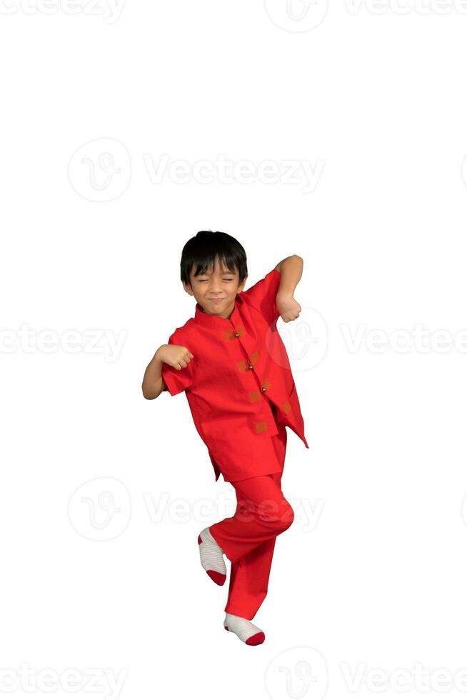 little boy fashion Smiling child in red chinese dress, style and fashion ideas for children. photo