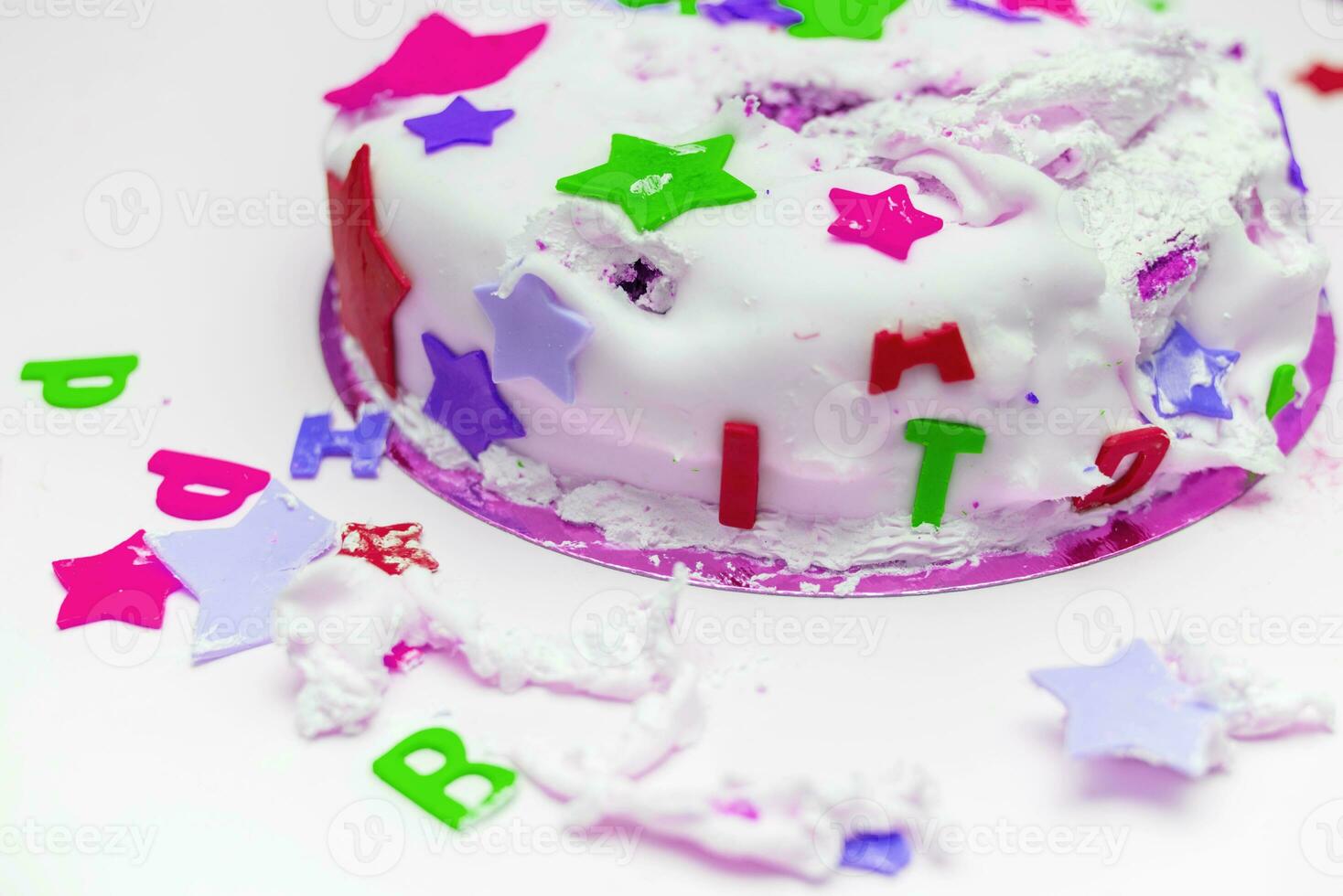 a birthday cake for a little child who broke it photo