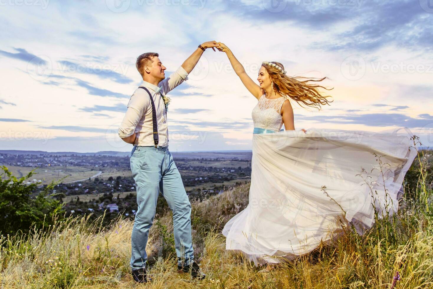 the bride and groom are photographed on the nature photo