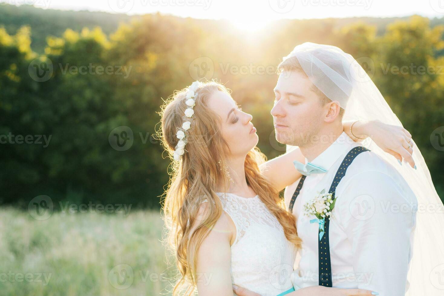 the bride and groom are photographed on the nature photo