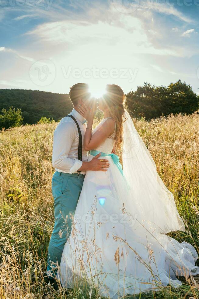 the bride and groom are photographed on the nature photo