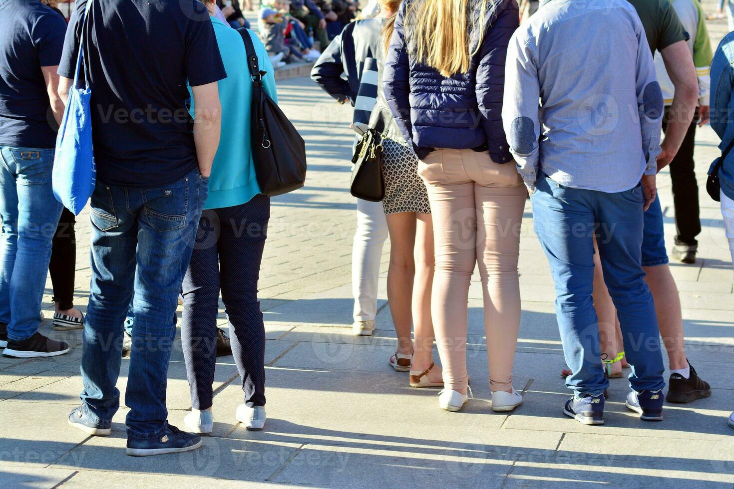 People walking on big city street, blurred motion crossing abstract photo