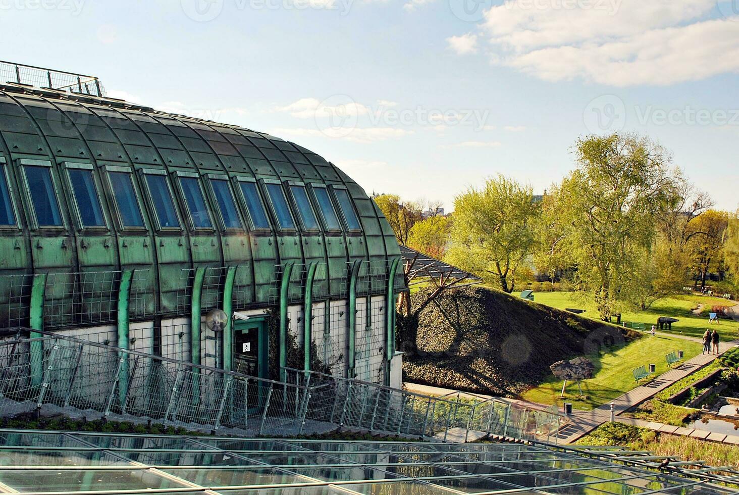 Modern office building in the city with windows and  steel and aluminum panels wall. photo