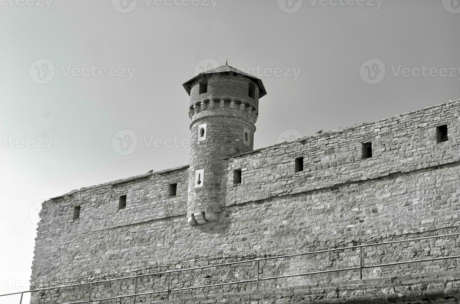 Medieval castle wall and tower photo