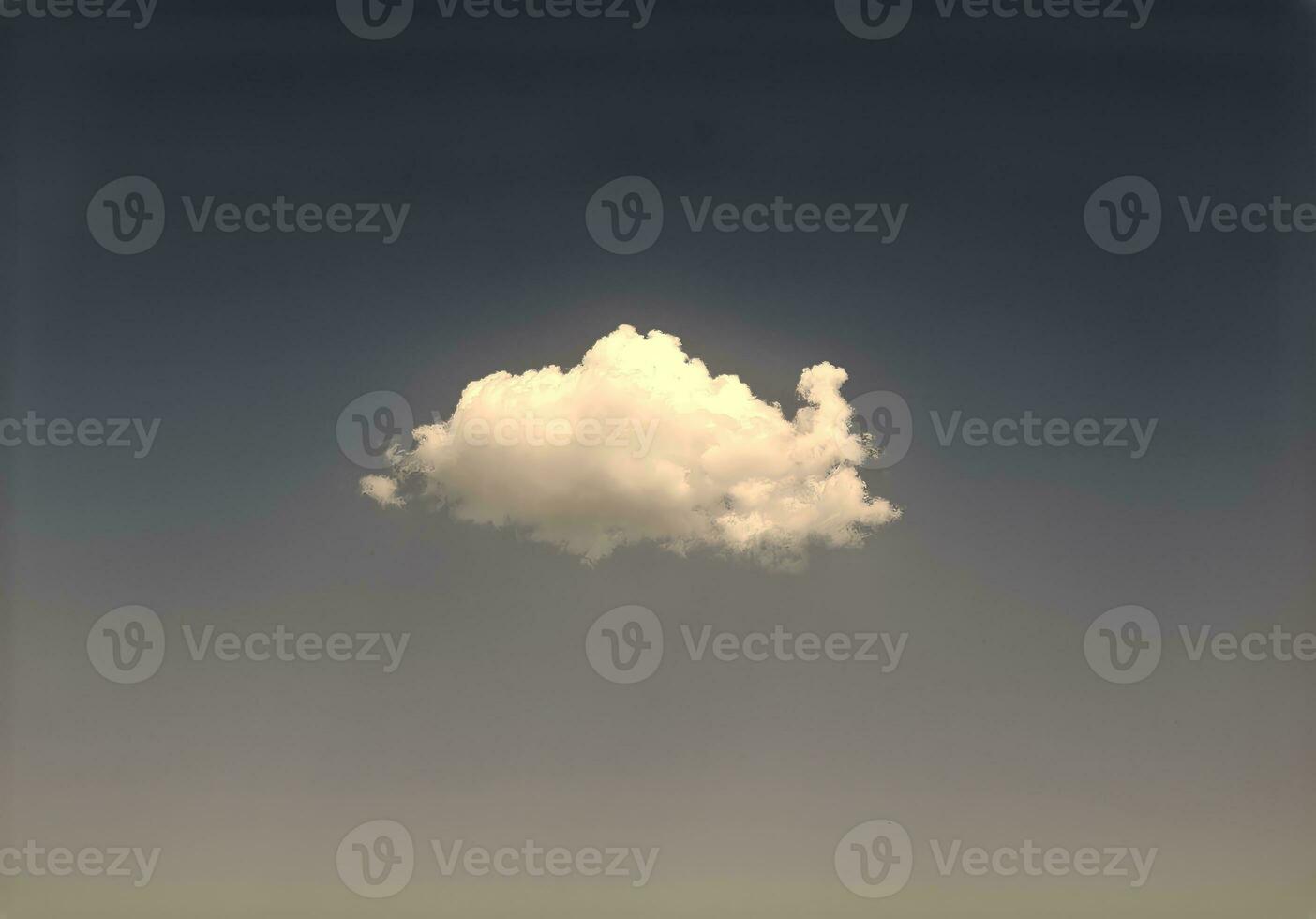 Single white cloud isolated over blue sky background, summer fluffy cloud photo