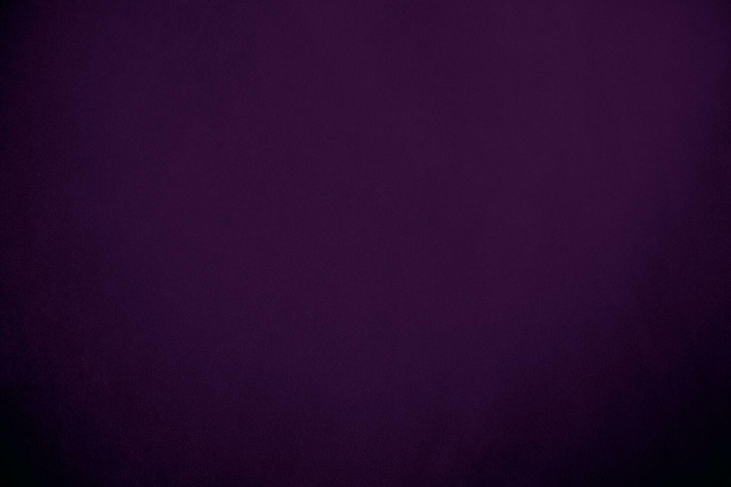 Dark purple velvet fabric texture used as background. Violet color panne fabric background of soft and smooth textile material. crushed velvet .luxury magenta tone for silk. photo