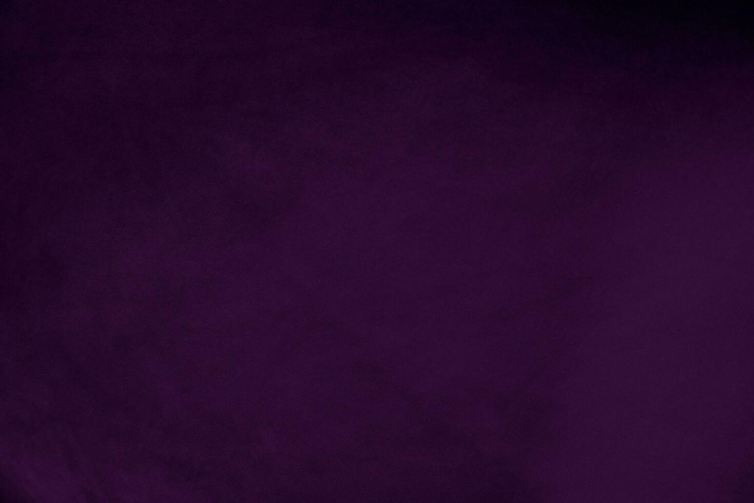 Dark purple velvet fabric texture used as background. Violet color panne fabric background of soft and smooth textile material. crushed velvet .luxury magenta tone for silk. photo
