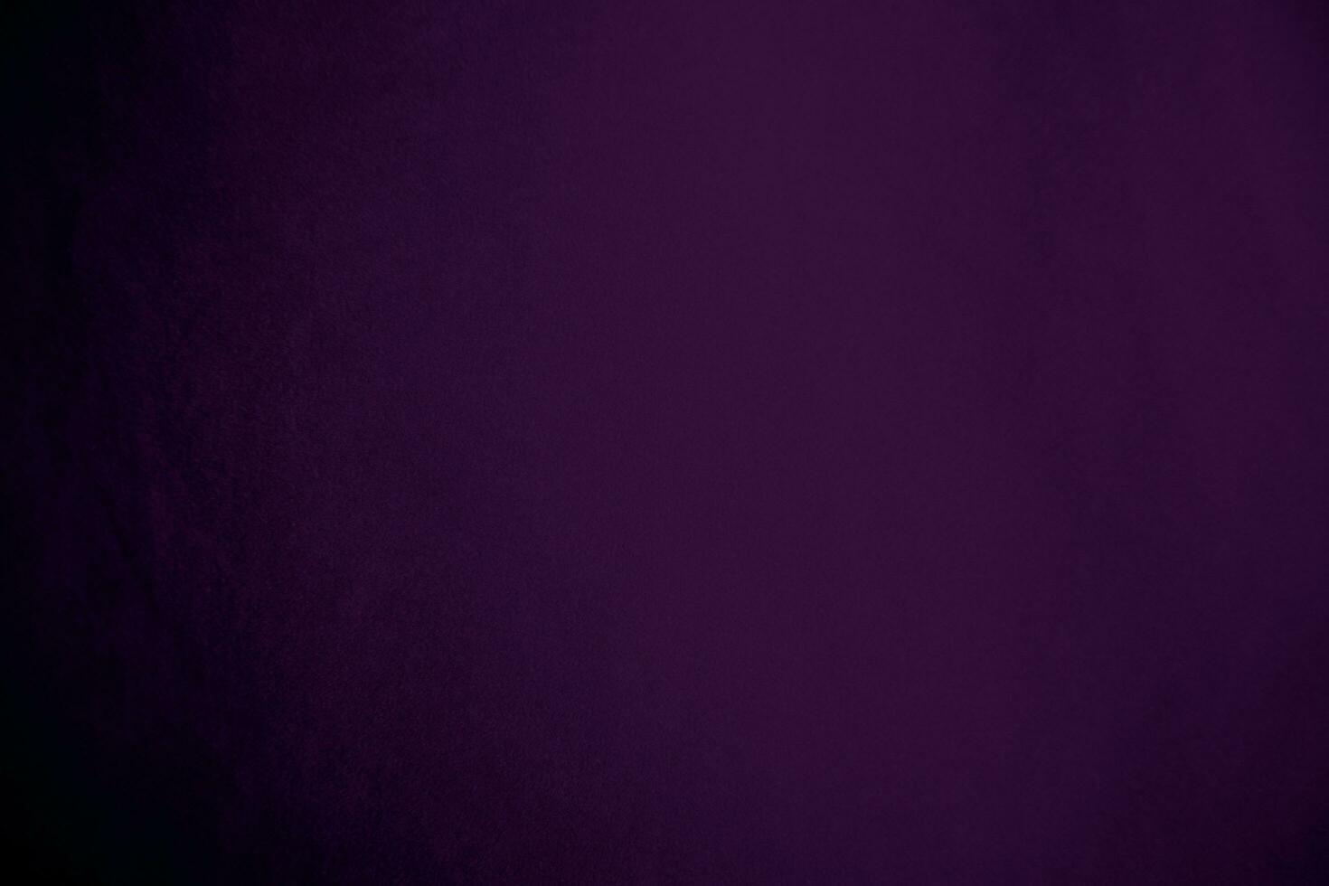 Dark purple velvet fabric texture used as background. Violet color panne fabric background of soft and smooth textile material. crushed velvet .luxury magenta tone for silk. photo