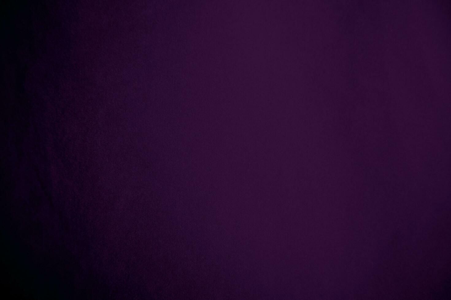 Dark purple velvet fabric texture used as background. Violet color panne fabric background of soft and smooth textile material. crushed velvet .luxury magenta tone for silk. photo