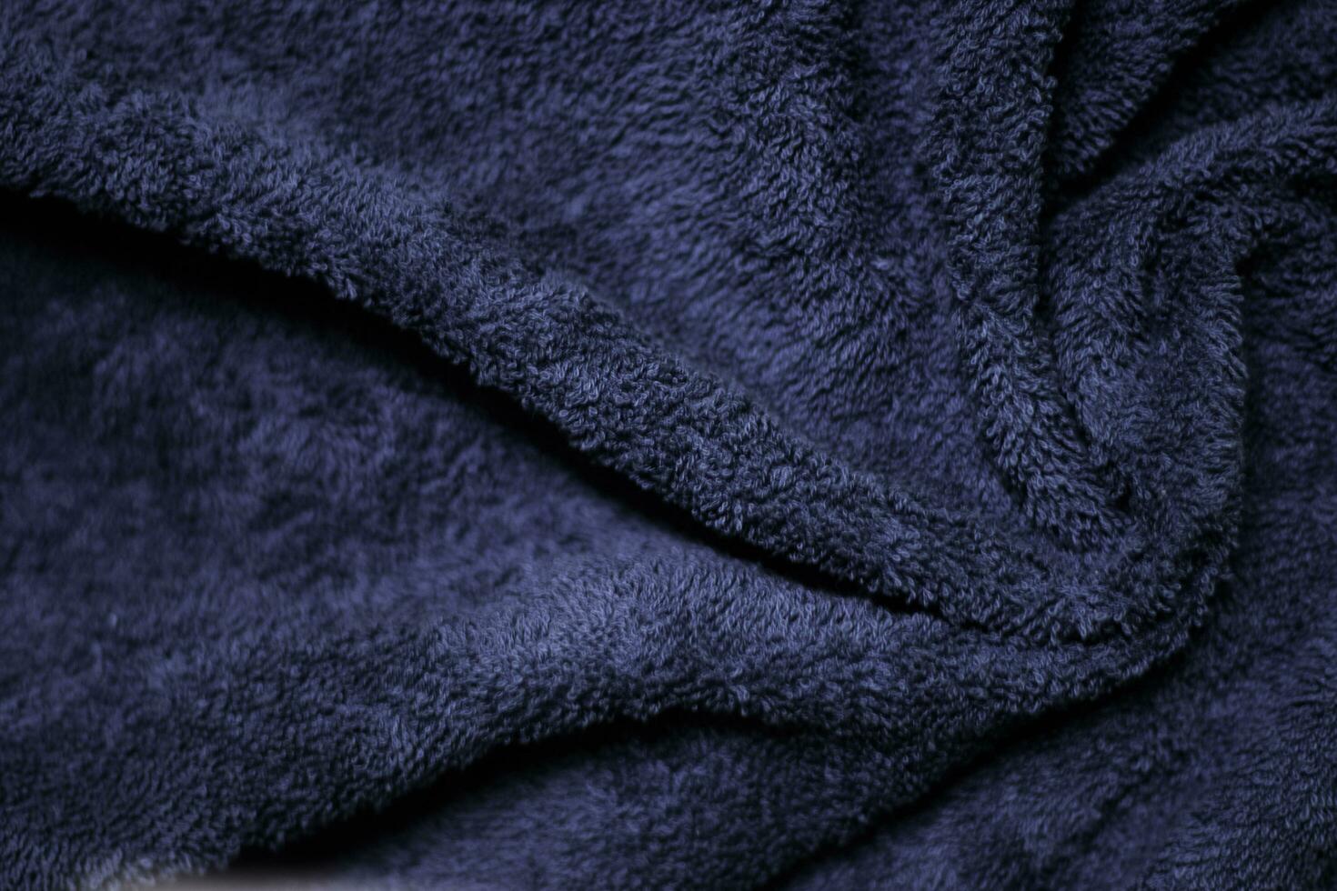 Dark blue velvet fabric texture used as background. Sky color panne fabric background of soft and smooth textile material. crushed velvet .luxury cobalt tone for silk. photo