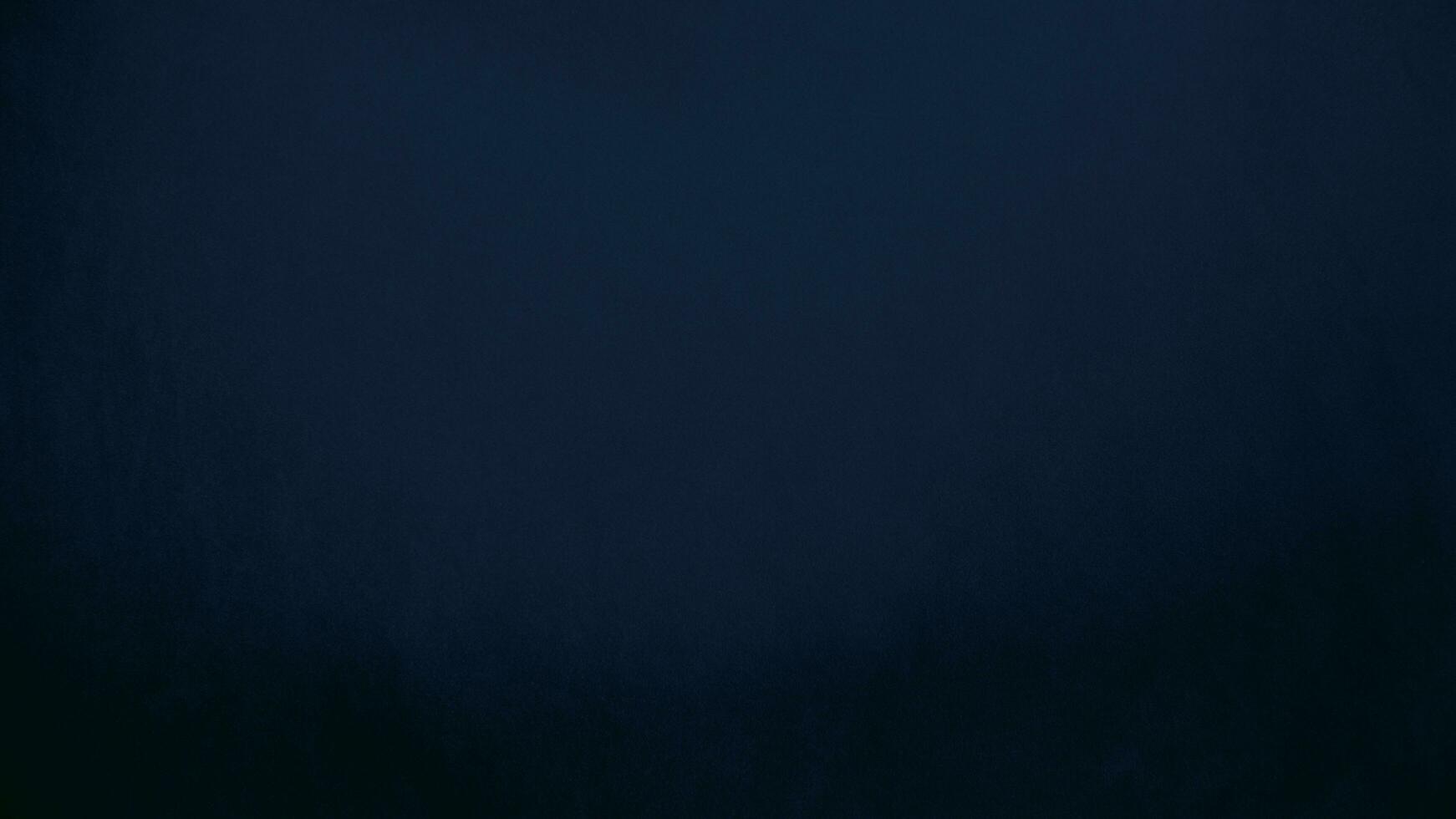 blue velvet  soft rough textile material background texture close up,poker table,tennis ball,table cloth. Empty navy blue fabric denim background. photo