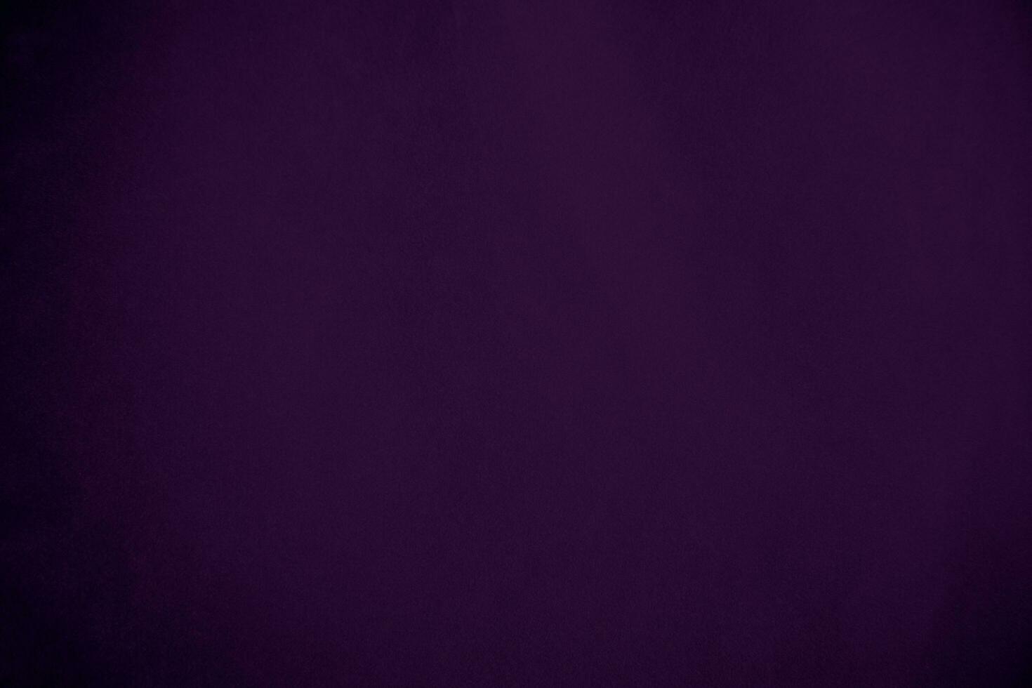 Dark purple velvet fabric texture used as background. Violet color panne fabric background of soft and smooth textile material. crushed velvet .luxury magenta tone for silk. photo