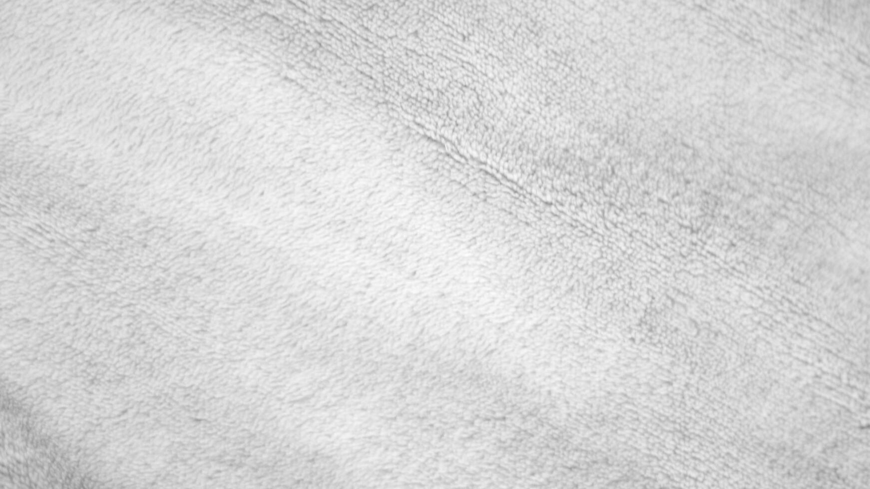 White clean wool texture background. light natural sheep wool. white seamless cotton. texture of fluffy fur for designers. close-up fragment white wool carpet... photo