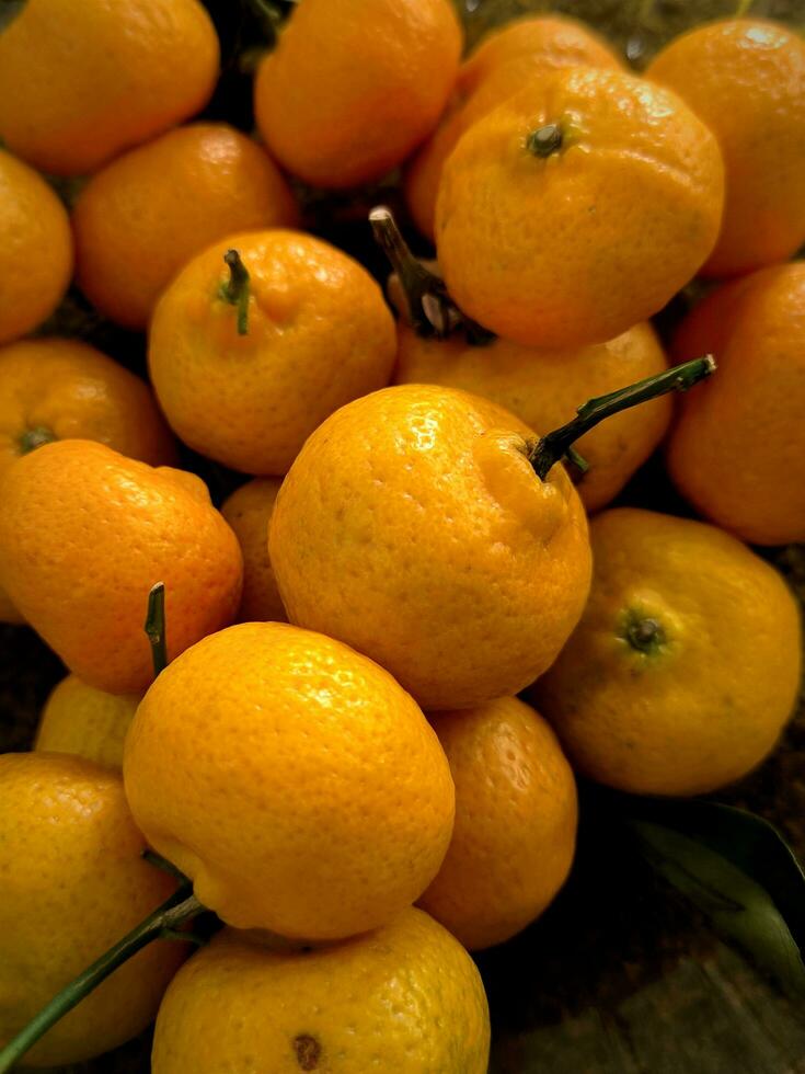 Fresh mandarin oranges fruit or tangerines or Citrus reticulata photo