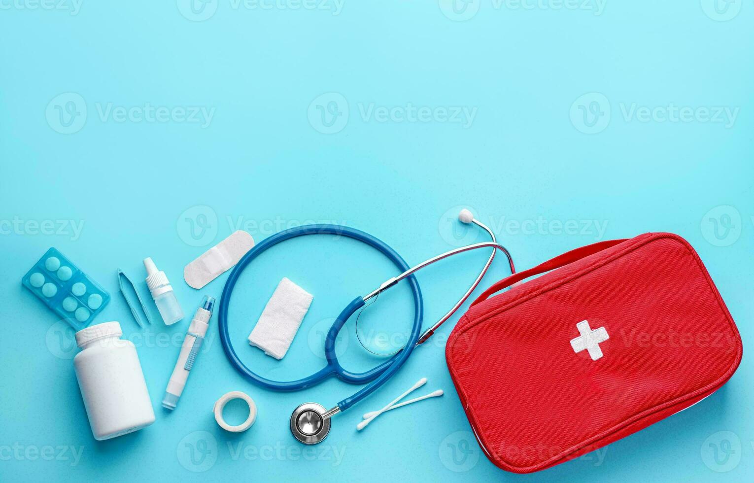 Emergency First Aid Kit, Medical Emergency Supplies for Health Care and Safety, Concept for Rescue and Treatment Support photo