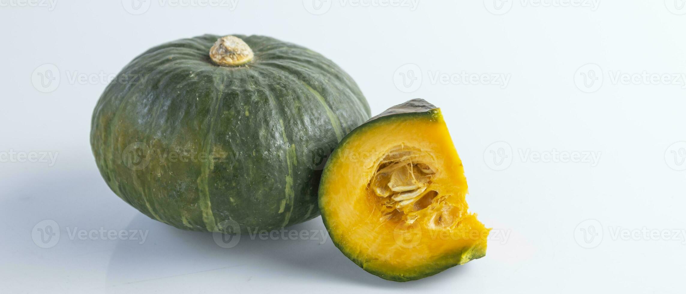 a green squash with a cut in half photo