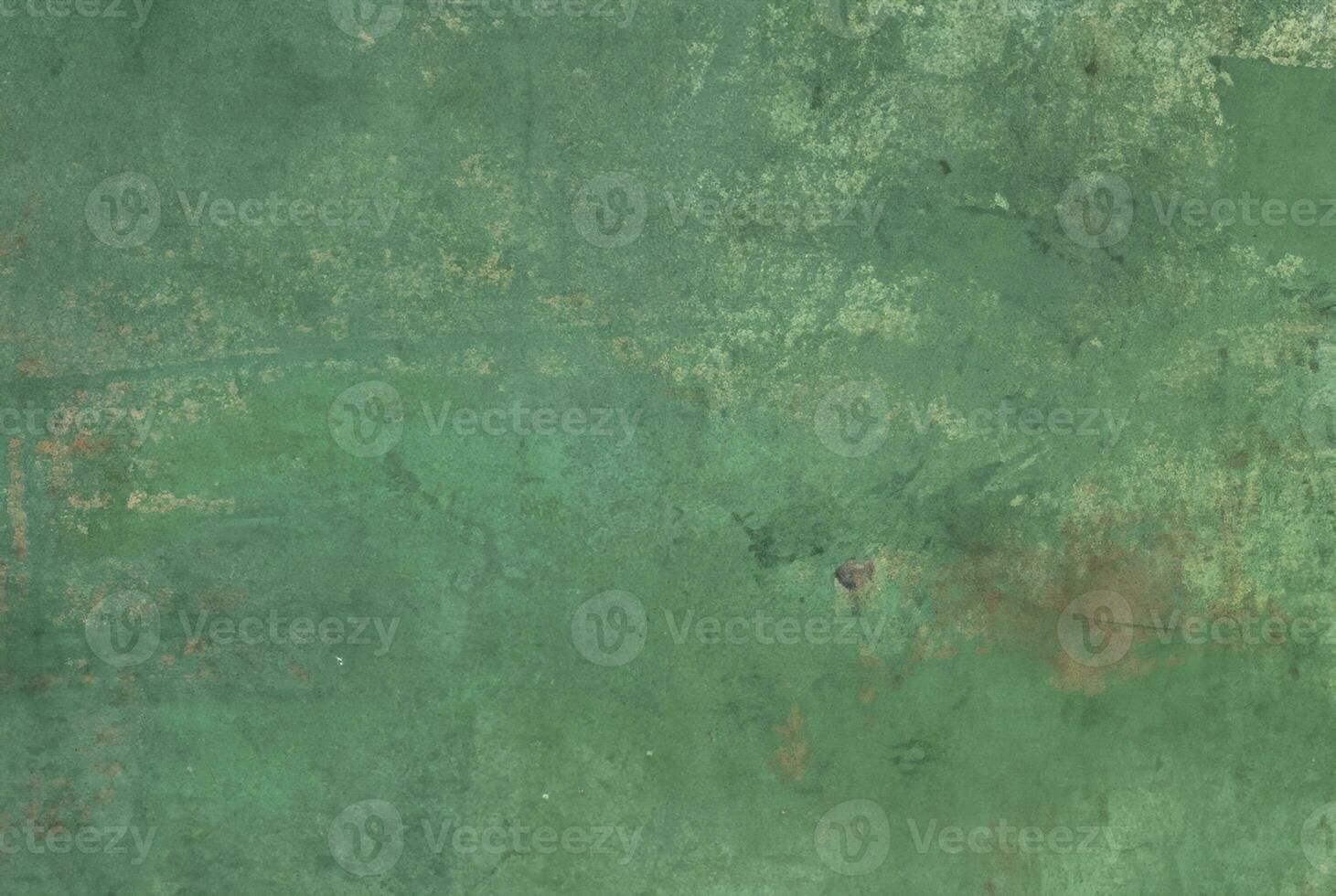 Texture of old green concrete wall for background photo