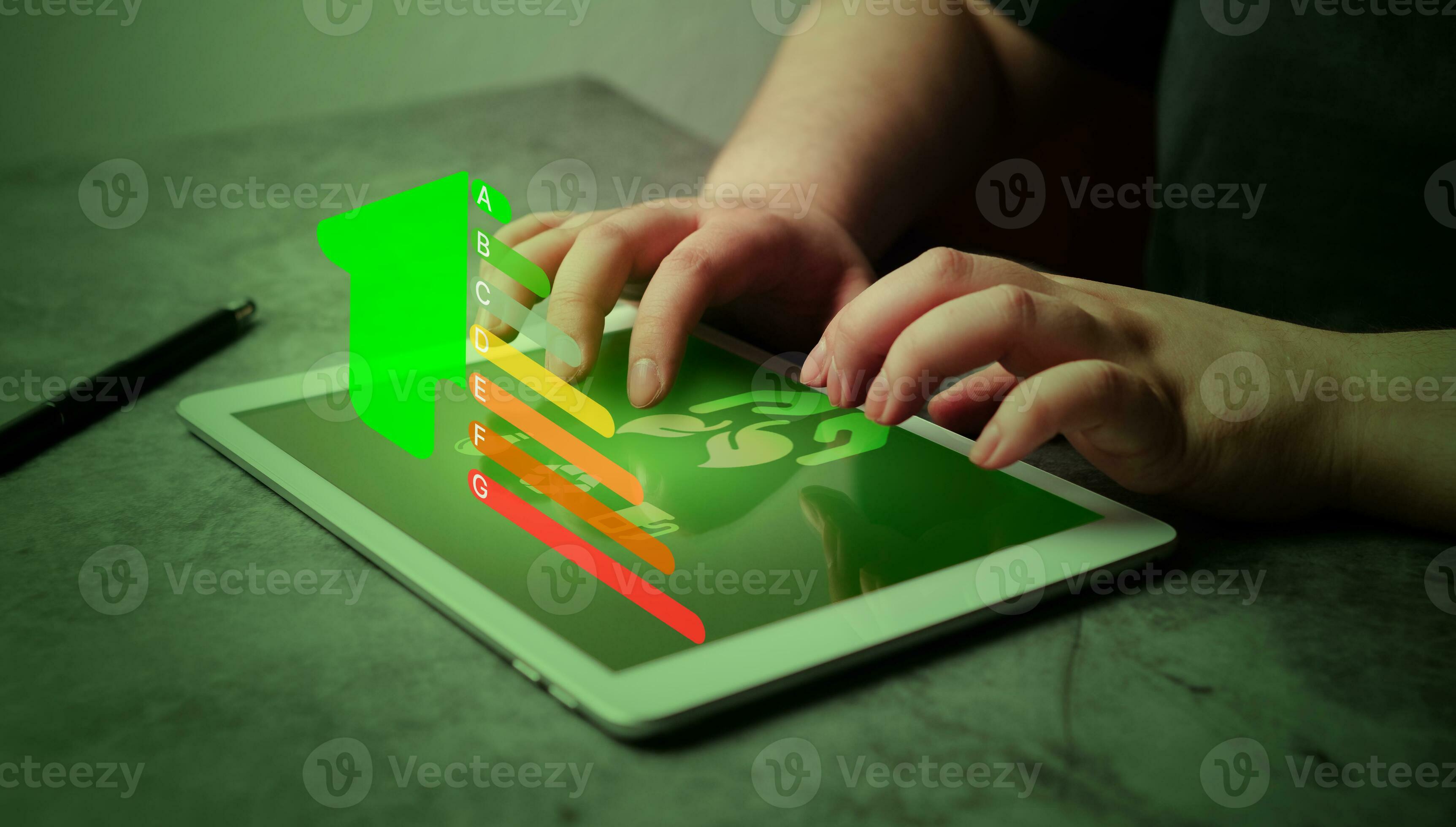 Woman use digital tablet for rating energy efficiency and eco home