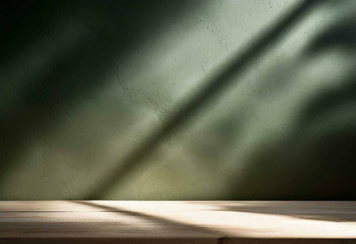 Table empty against background of dark green plaster wall. composition featuring light reflections photo