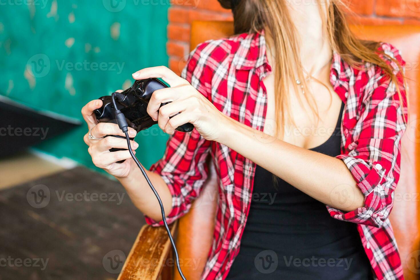 technology, virtual reality, entertainment and people concept - woman with vr headset playing game. photo