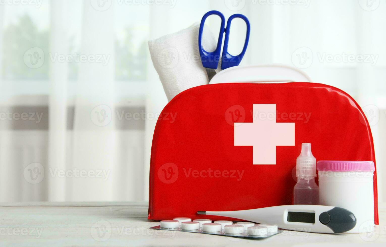 Emergency First Aid Kit, Medical Emergency Supplies for Health Care and Safety, Isolated for Rescue and Treatment Support photo