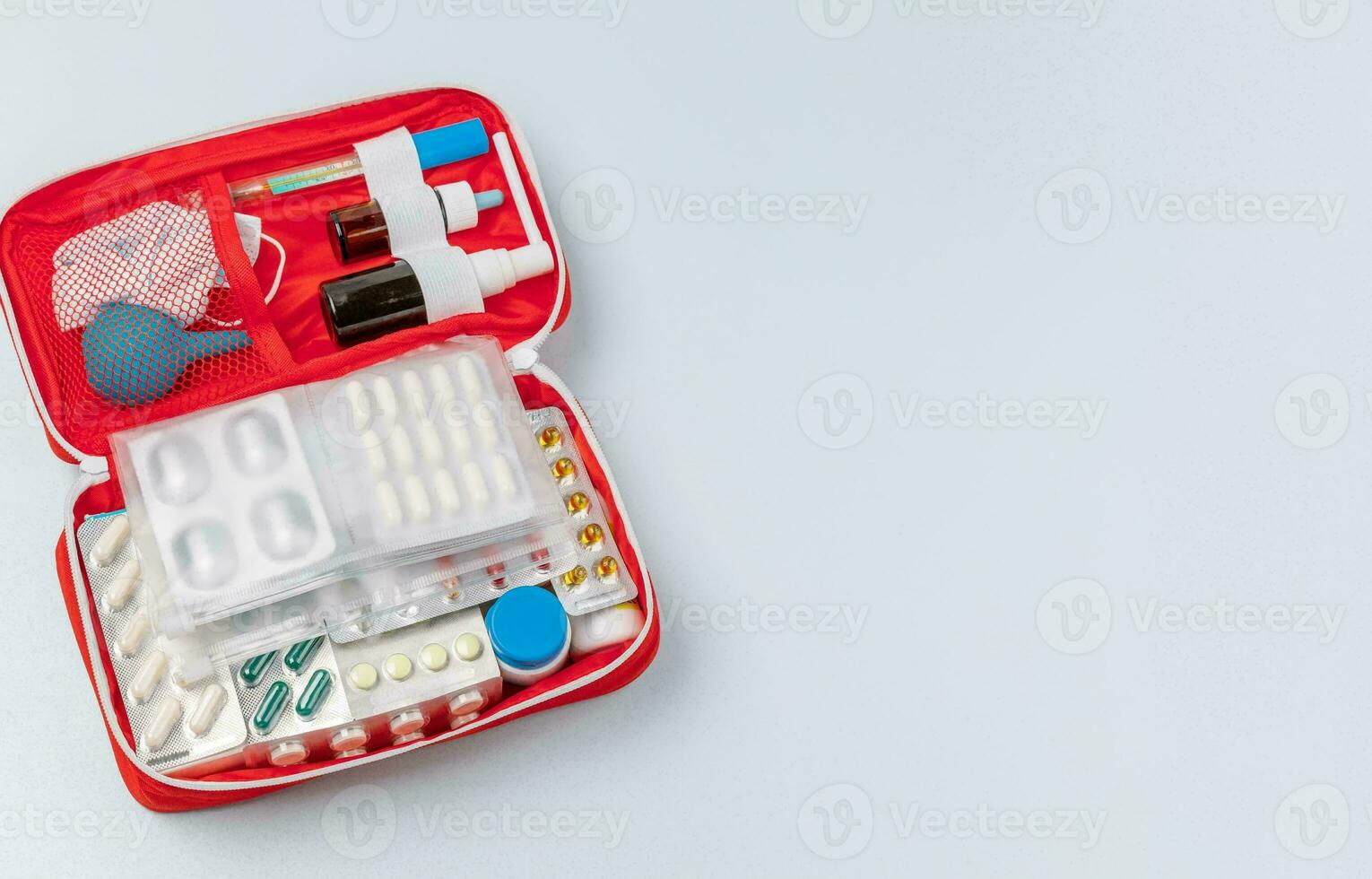 Emergency First Aid Kit, Medical Emergency Supplies for Health Care and Safety, Isolated for Rescue and Treatment Support photo