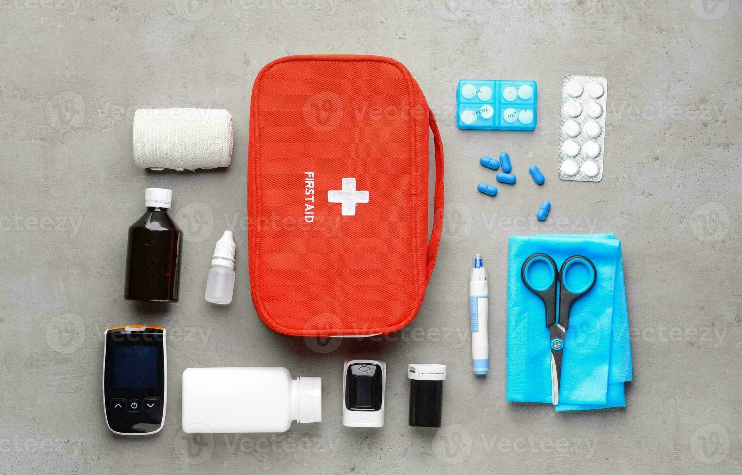 Emergency First Aid Kit, Medical Emergency Supplies for Health Care and Safety, Concept for Rescue and Treatment Support photo