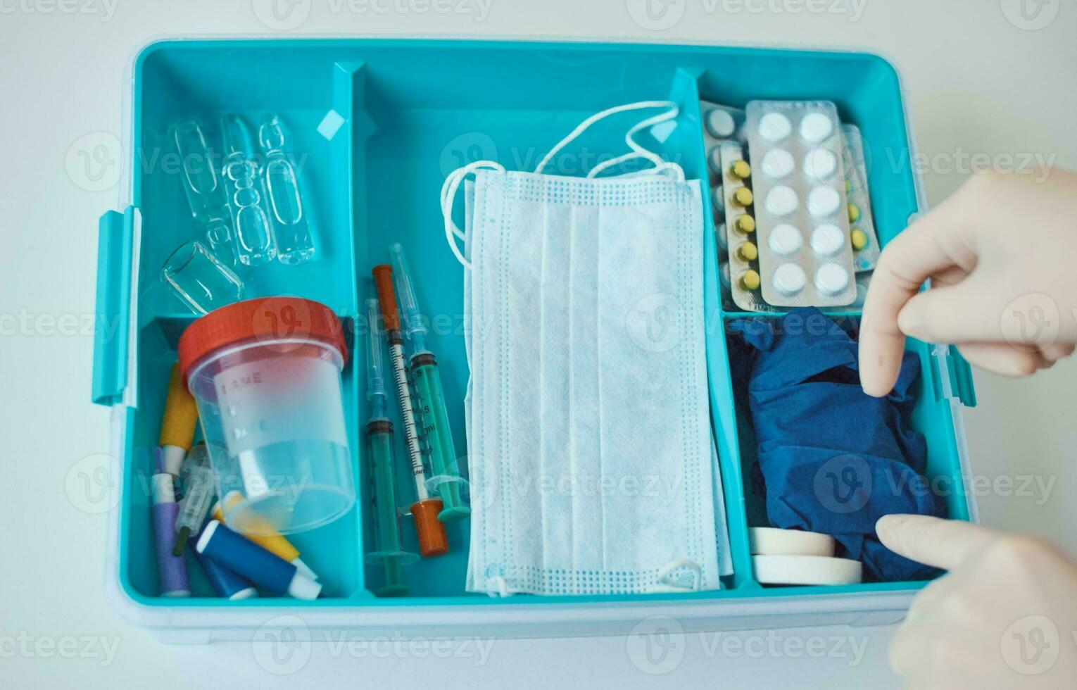 Emergency First Aid Kit, Medical Emergency Supplies for Health Care and Safety, Concept for Rescue and Treatment Support photo