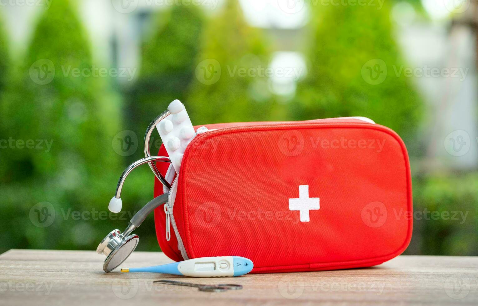 Emergency First Aid Kit, Medical Emergency Supplies for Health Care and Safety, Concept for Rescue and Treatment Support photo