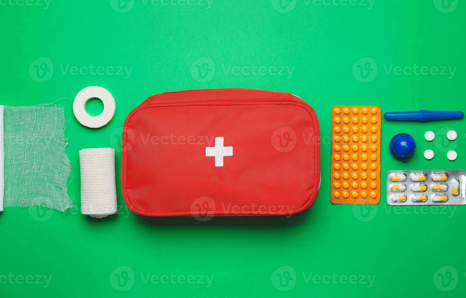 Emergency First Aid Kit, Medical Emergency Supplies for Health Care and Safety, Concept for Rescue and Treatment Support photo