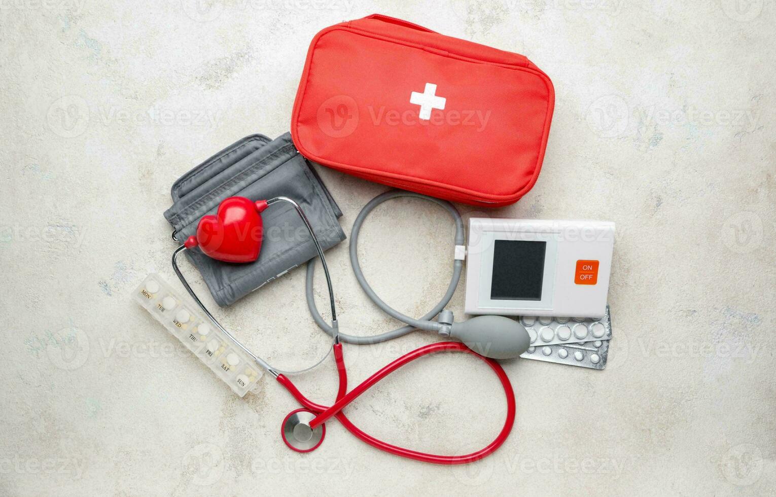 Emergency First Aid Kit, Medical Emergency Supplies for Health Care and Safety, Concept for Rescue and Treatment Support photo