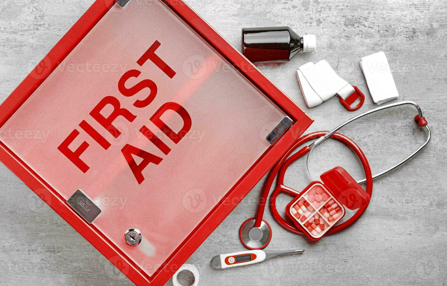 Emergency First Aid Kit, Medical Emergency Supplies for Health Care and Safety, Concept for Rescue and Treatment Support photo