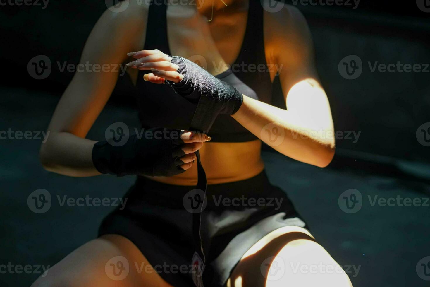 Closeup and crop sport woman action in boxing with natural light on blurred background. photo