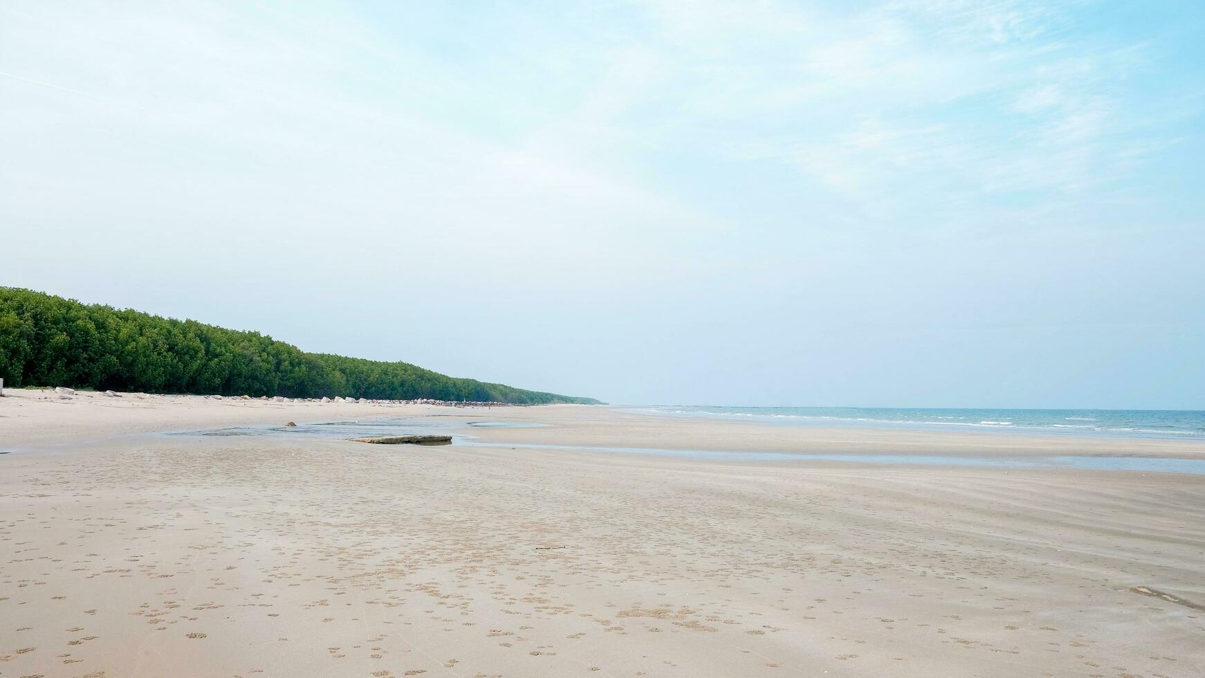 Scene of HuaHin beach in a smoot colors. photo