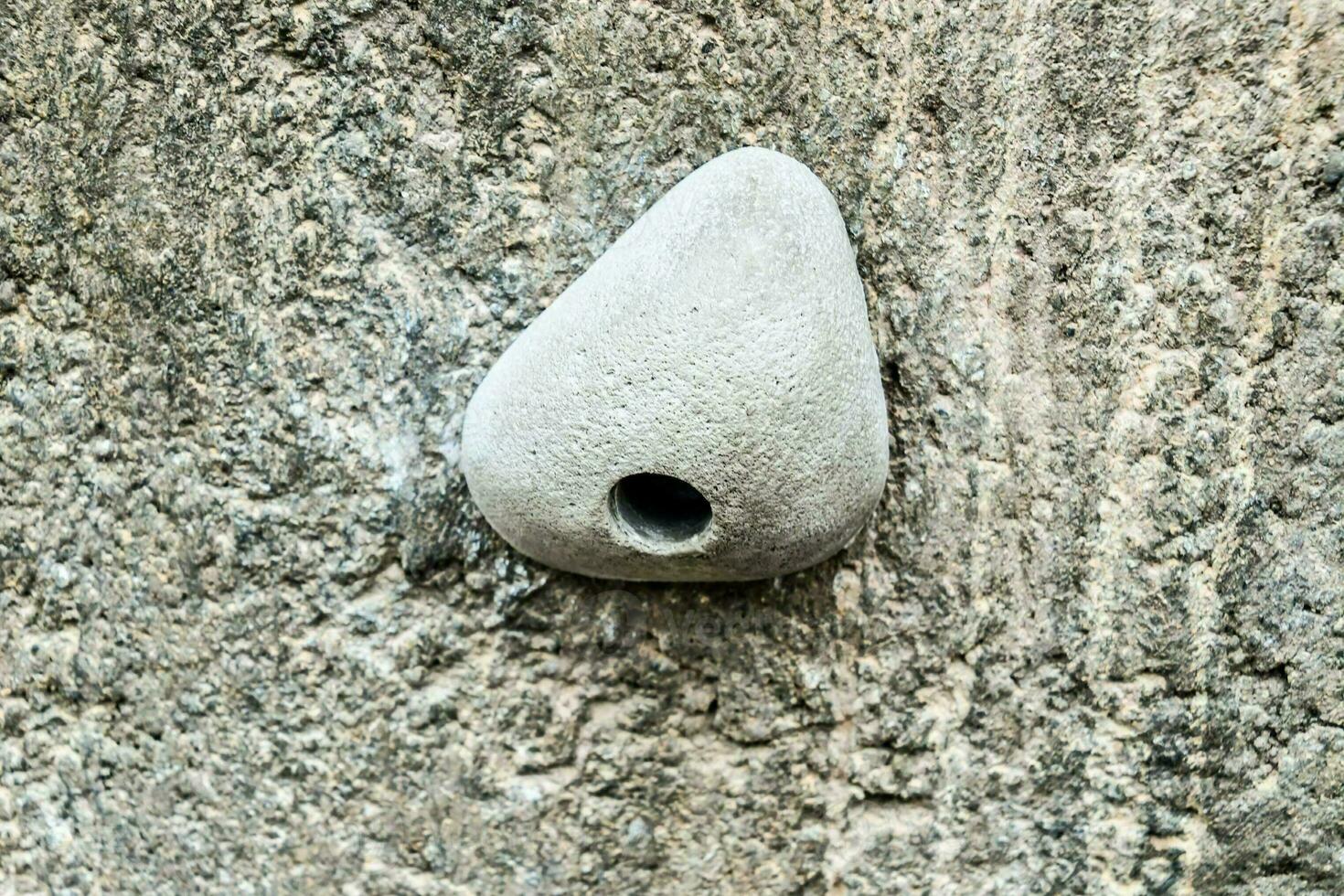 close up of a rock climbing wall photo