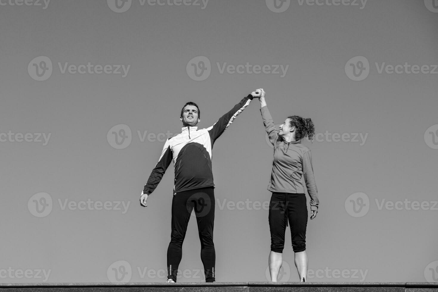 Couple exercising together photo