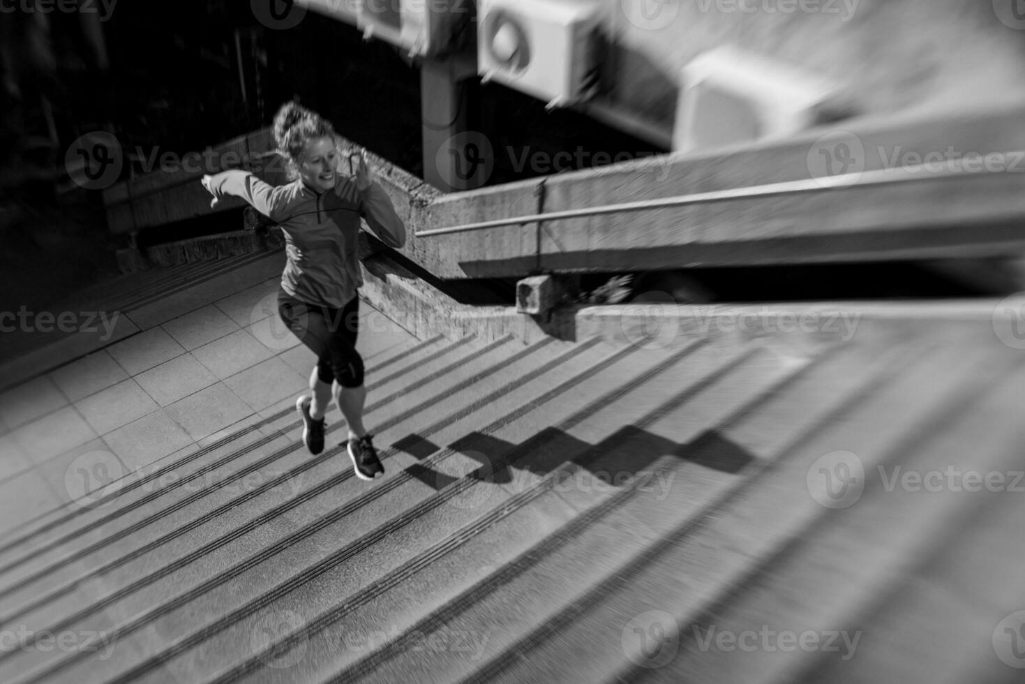 Woman exercising - black and white photo