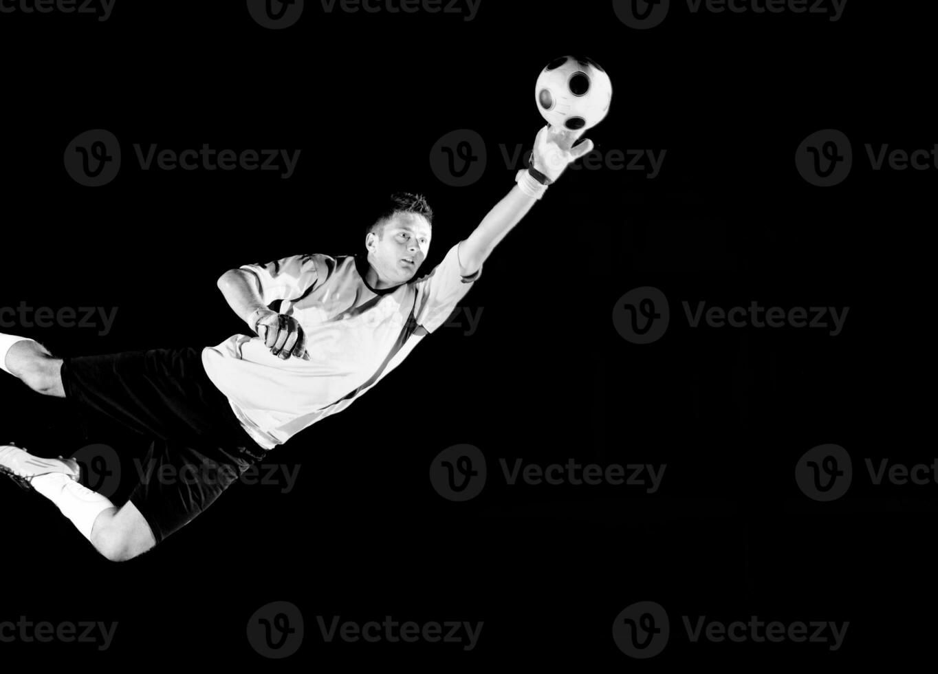 Man playing soccer photo