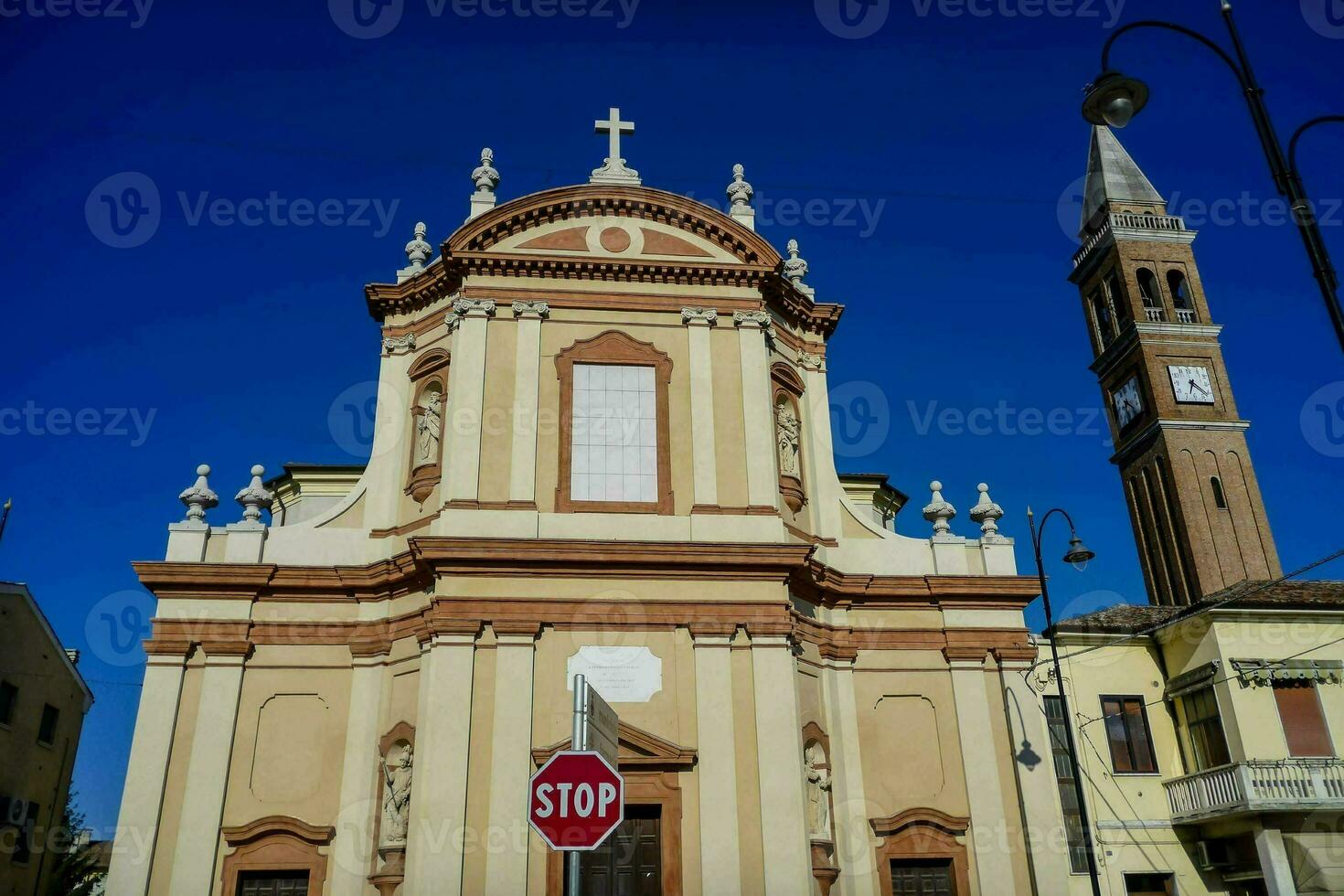 a church with a stop sign in front of it photo