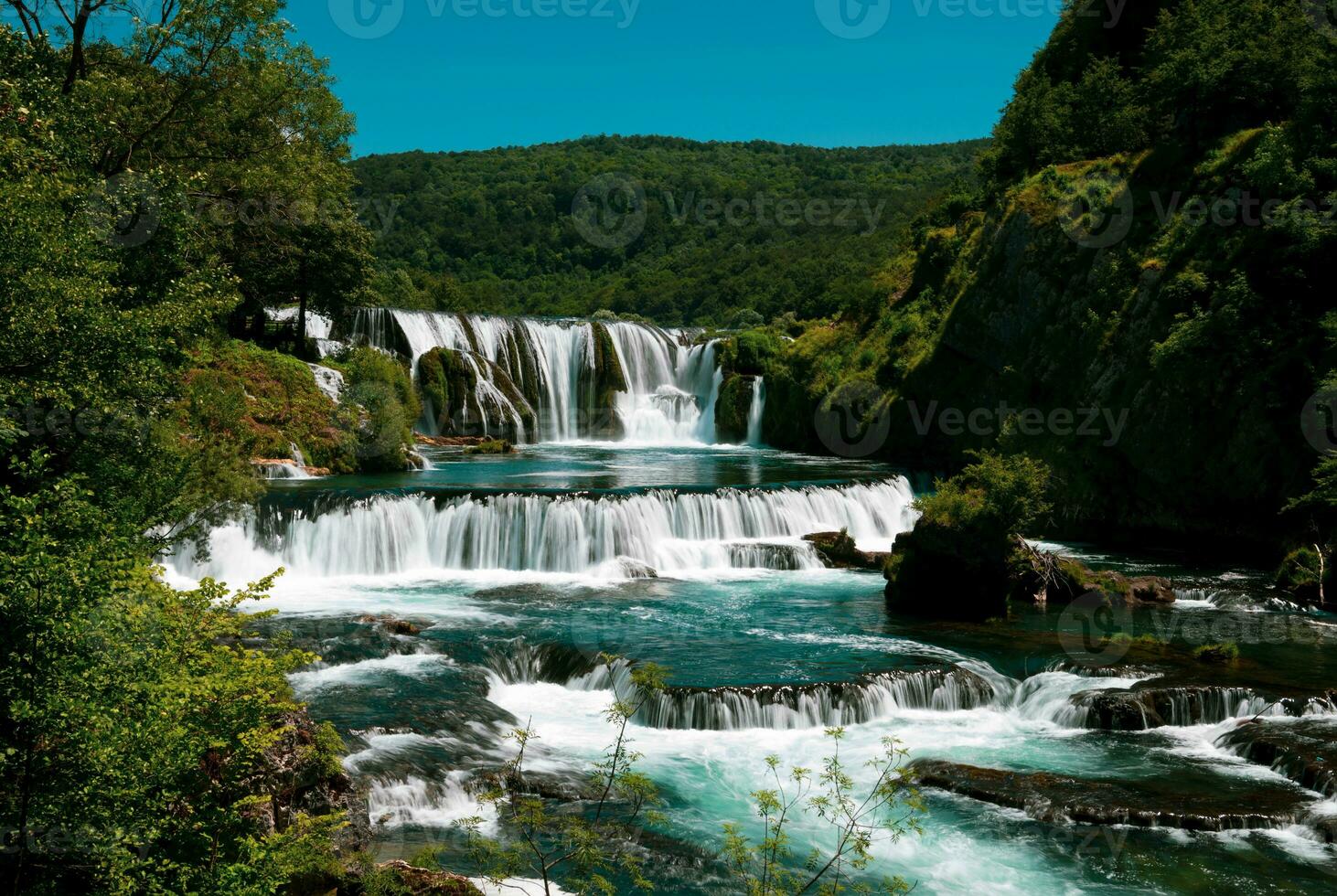 Scenic waterfall view photo