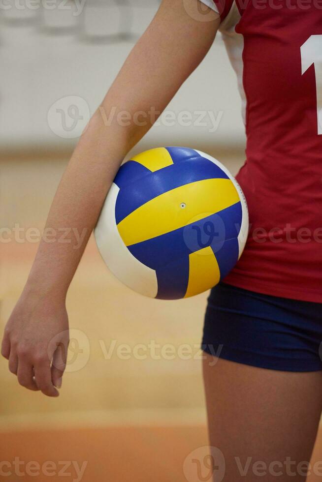 Girl playing volleyball photo