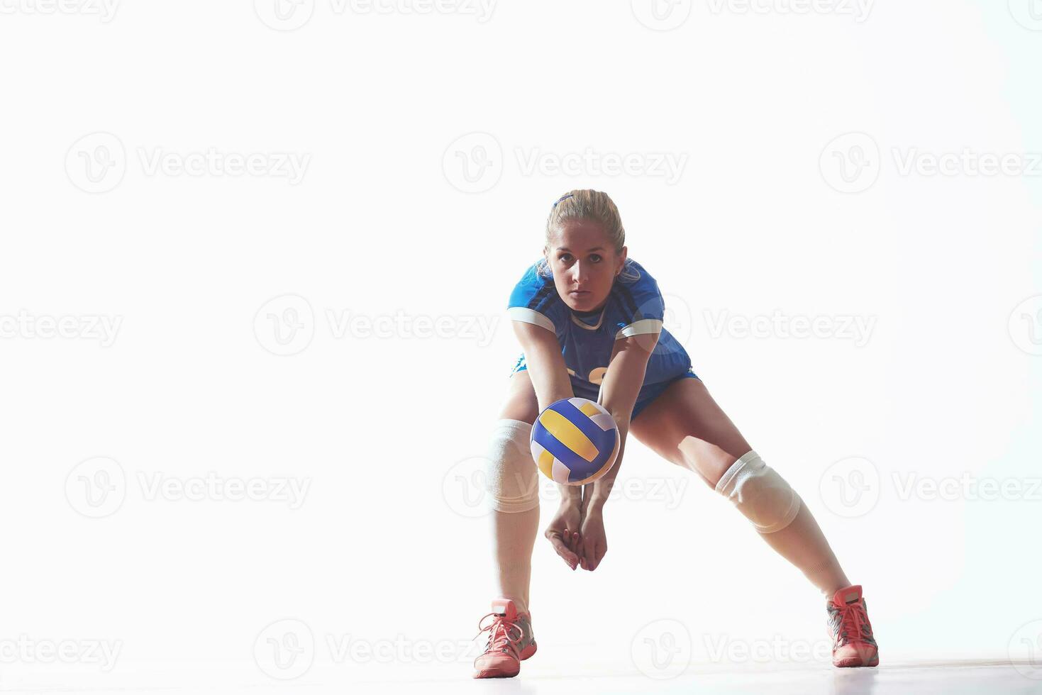 Woman playing volleyball photo