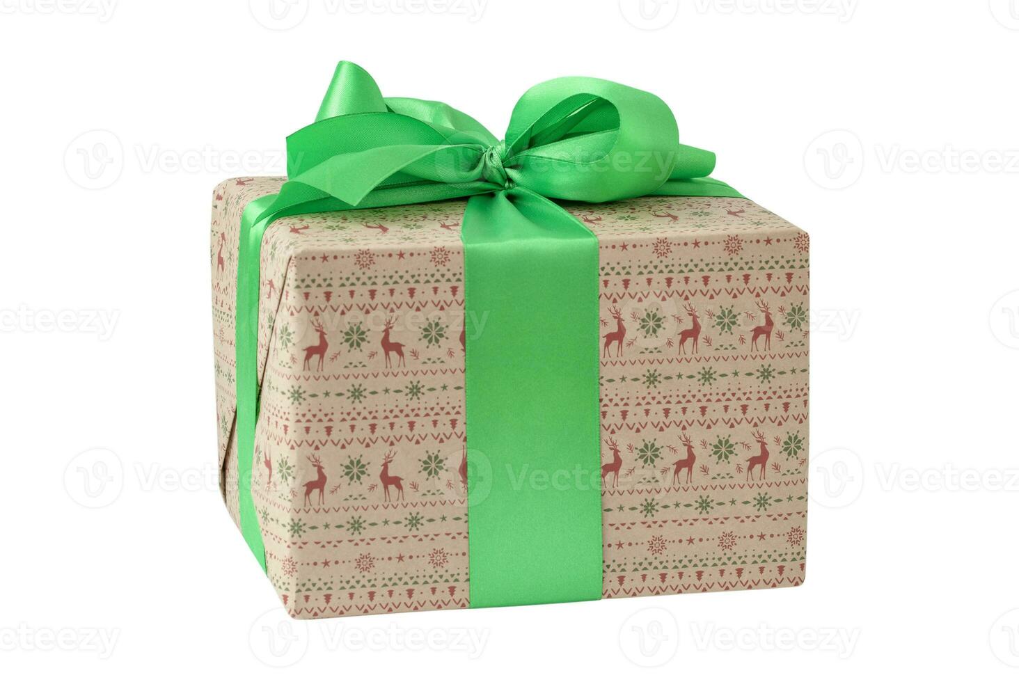 Isolated holiday box with green ribbon on the white background photo
